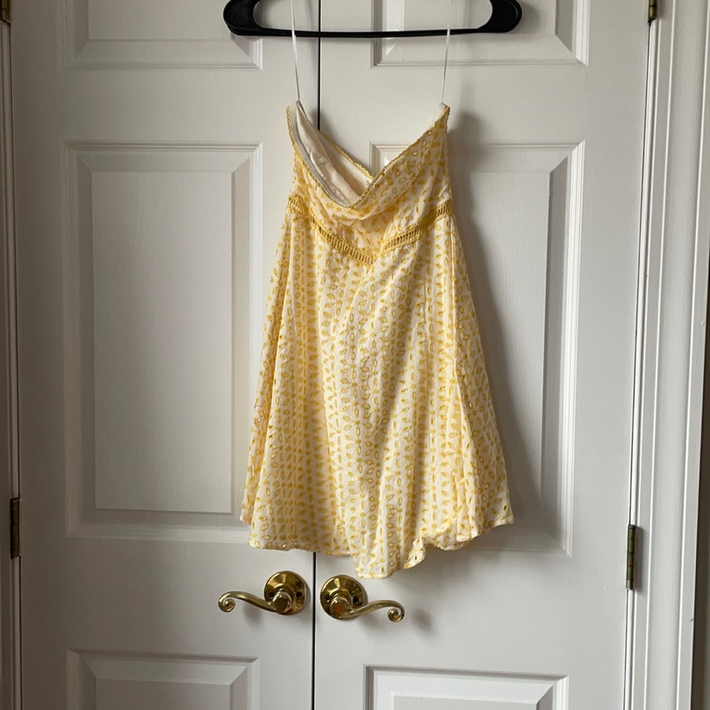 White with yellow embroidery mini dress. Miami brand from Francesca’s. Size XXS